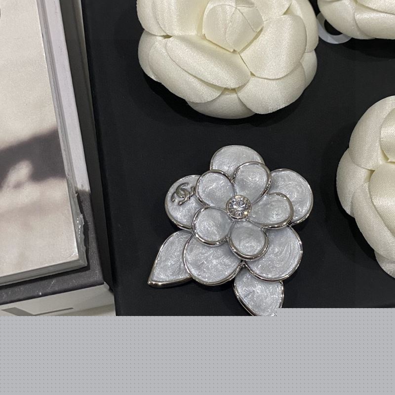 Ch*el brooches